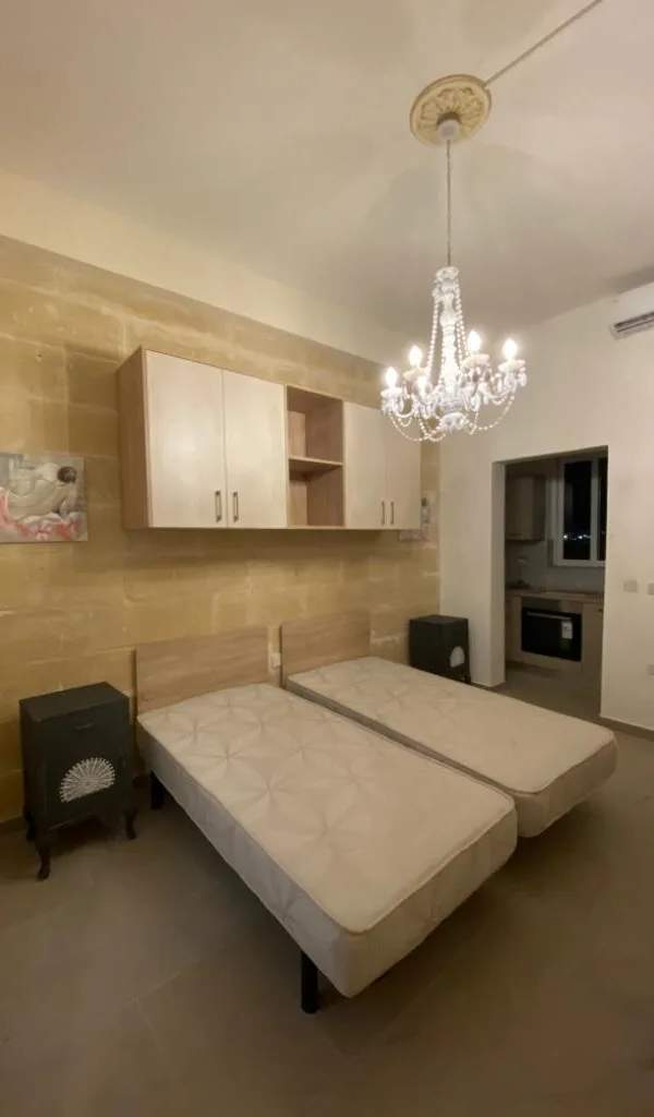 Paola ready to move into studio penthouse overlooking Paola Square