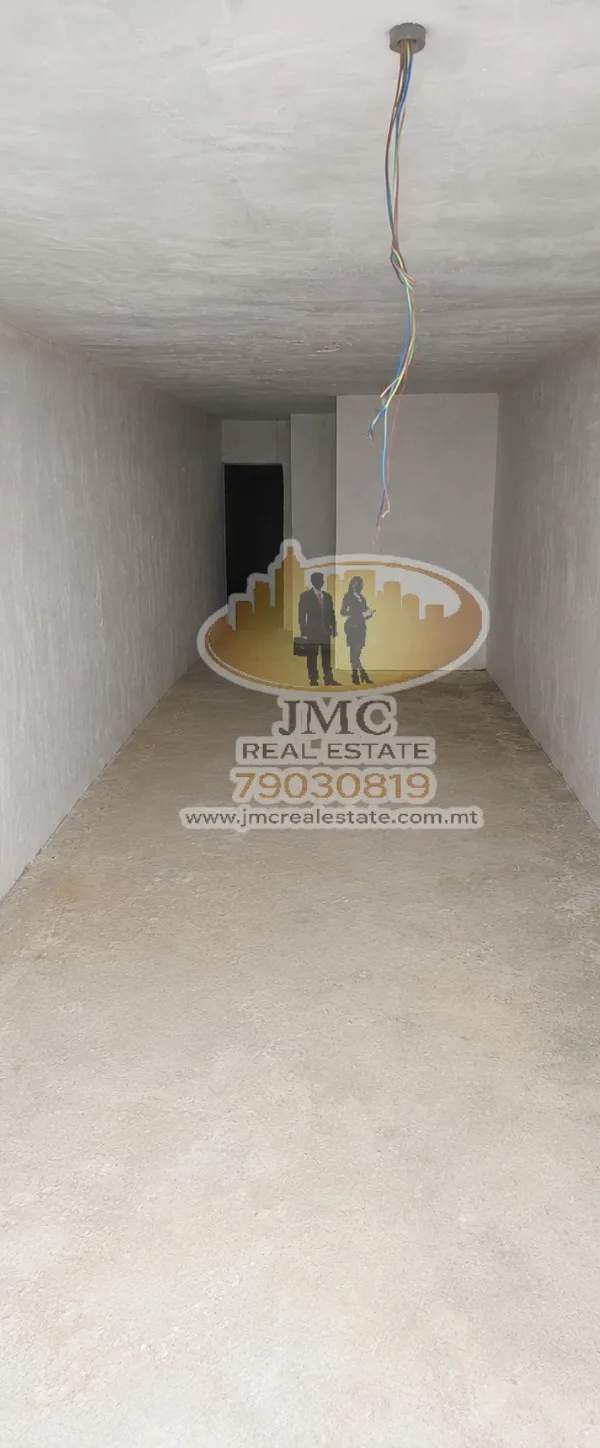 Msida street level 10-car garage with adjacent office