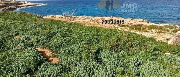 Xghajra 725sqm field with sea view